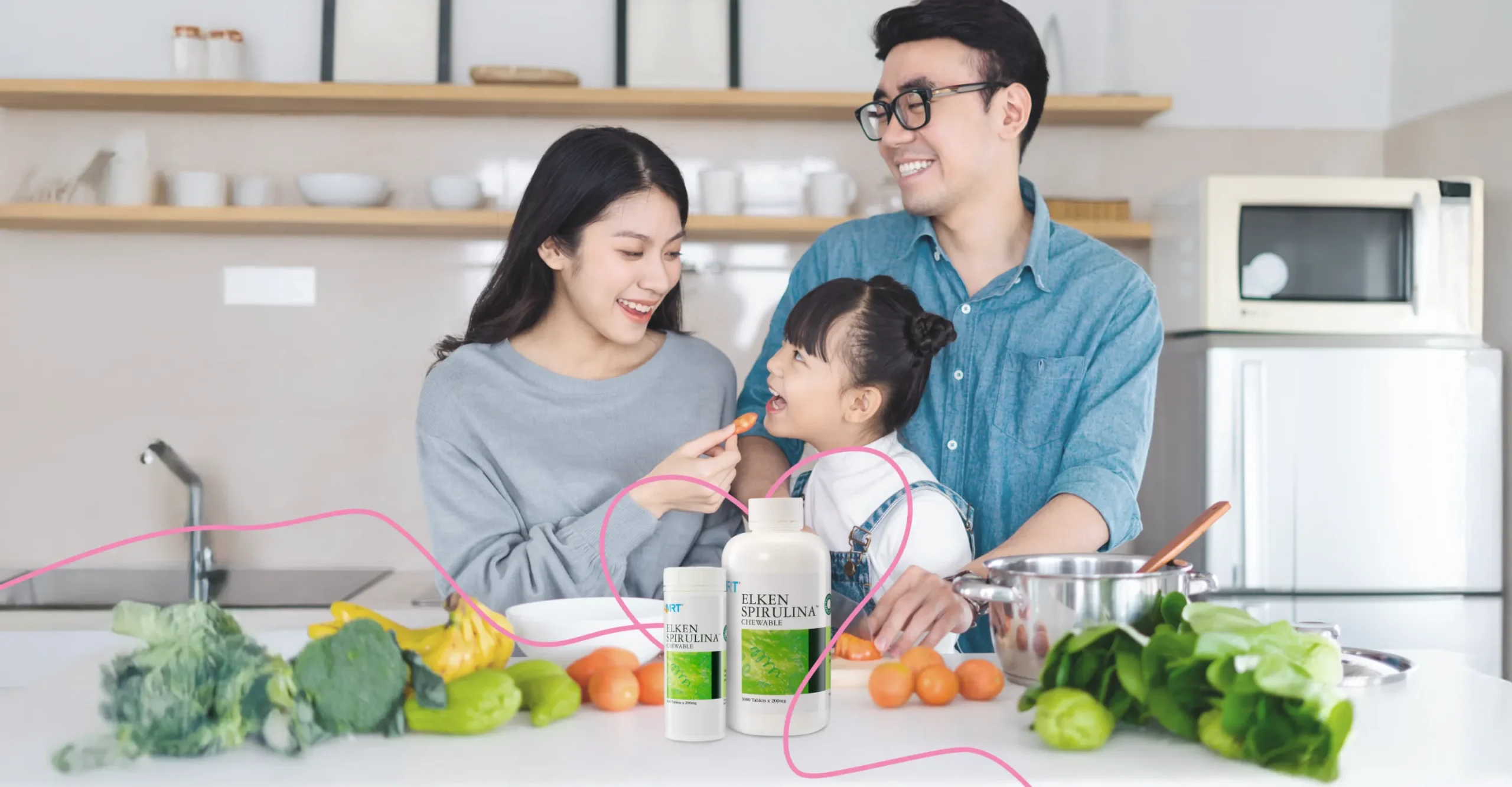 Happy family preparing healthy food together with Elken wellness products in kitchen